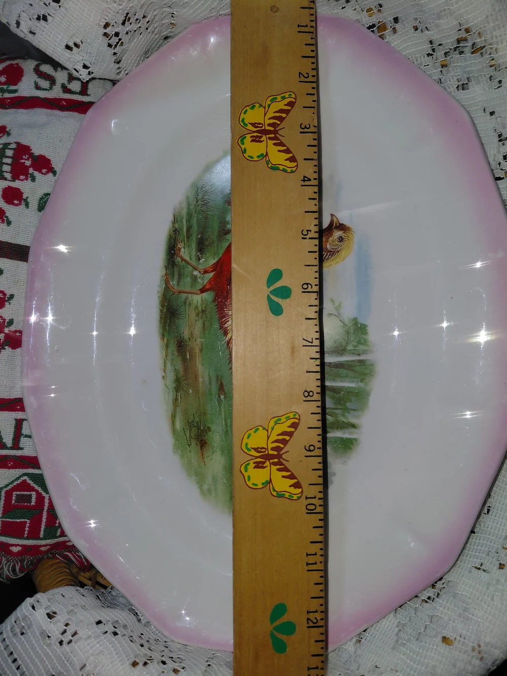 This 1924 antique S.P. Co Sebring hand-painted pheasant platter